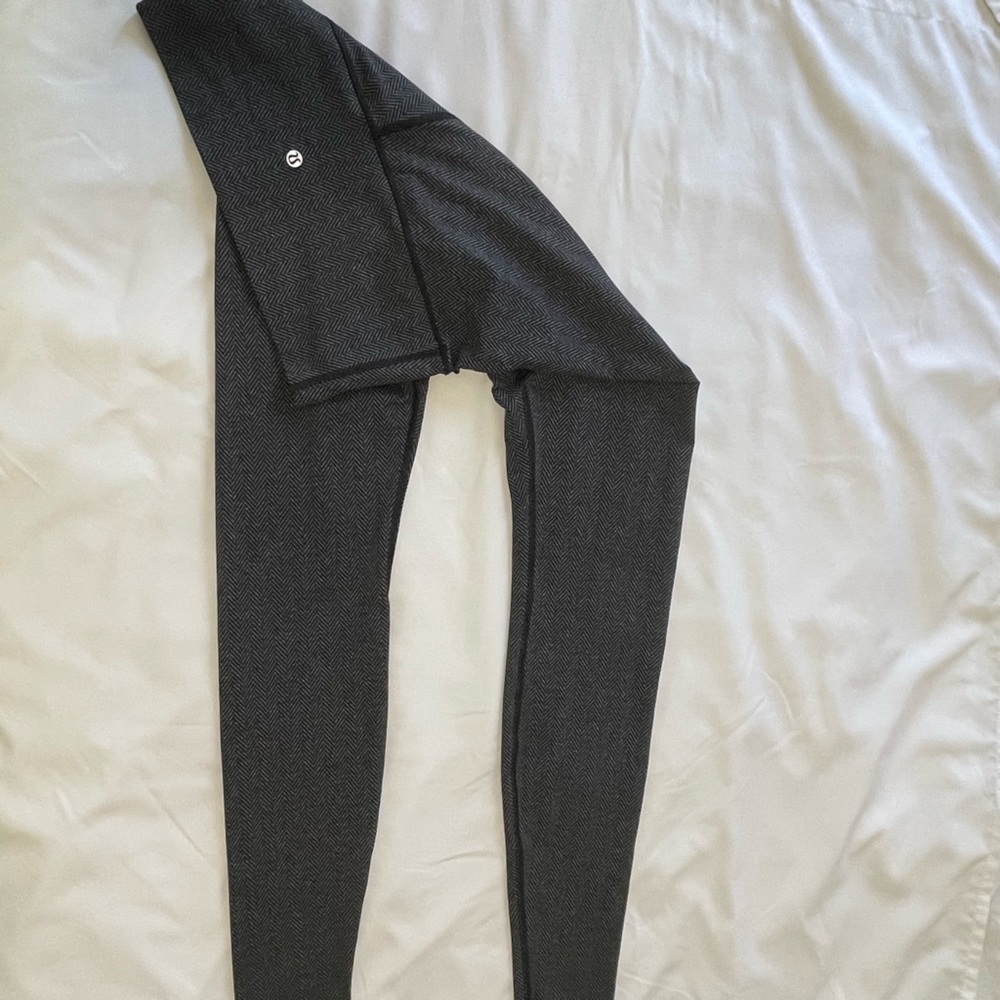 Lululemon size 8 grey and black print leggings. Worn once like new condition!!